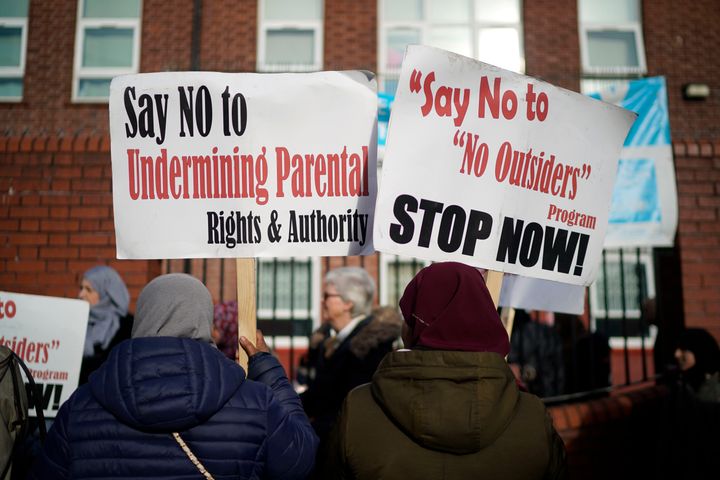 Parents and protestors demonstrate against the 'No Outsiders' programme, which teaches children about LGBT rights, at Parkfield Community School.