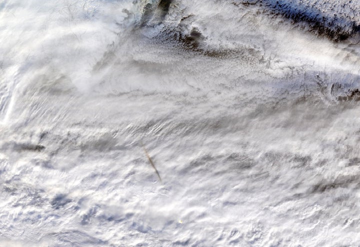 The Terra satellite's Moderate Resolution Imaging SpectroRadiometer (MODIS) instrument snapped this true-color photo showing remnants of the Dec. 18 meteor's passage.