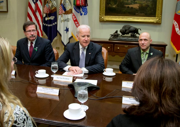 Vice President Joe Biden met with Newtown shooting family members, including Jeremy Richman (right), at the White House in December 2013 to discuss efforts to increase access to mental health services. (AP Photo/Carolyn Kaster)