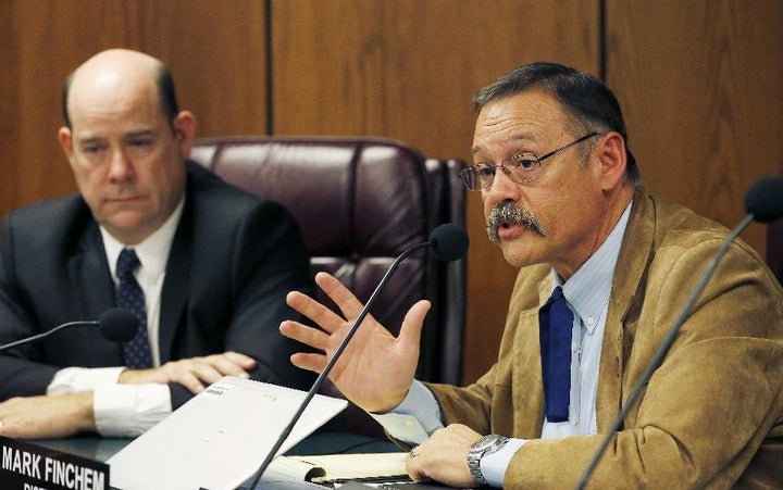 Arizona state Rep. Mark Finchem (right) wrote that there was no "far-right" at the Unite the Right rally in a 2017 blog post.