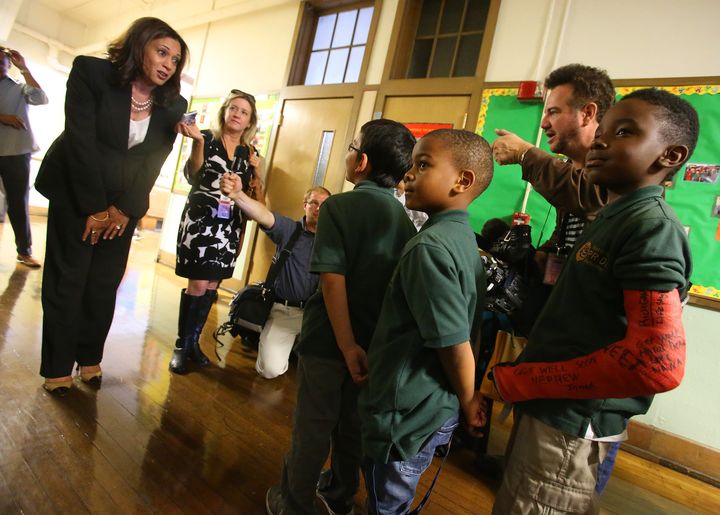 Harris, who was the attorney general for California at the time, talks with students at the East Oakland Pride Elementary School in Oakland on Sept. 4, 2014. She sponsored legislation to help local school districts and communities address California's elementary school truancy crisis.