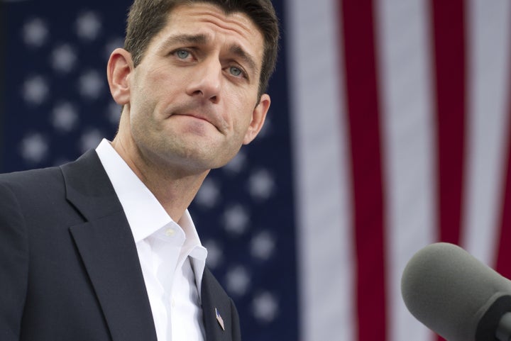 Wisconsin Representative Paul Ryan speaks after US Republican presidential candidate and former Massachusetts Governor Mitt Romney announced Ryan as his vice presidential running mate during a campaign rally at the Nauticus Museum after touring the USS Wisconsin in Norfolk, Virginia, August 11, 2012. Romney and his new running mate embark on the first day of a 4-day bus trip that will take the White House hopefuls to 4 key swing states, Virginia, North Carolina, Florida and Ohio. AFP PHOTO / Saul LOEB (Photo credit should read SAUL LOEB/AFP/GettyImages)