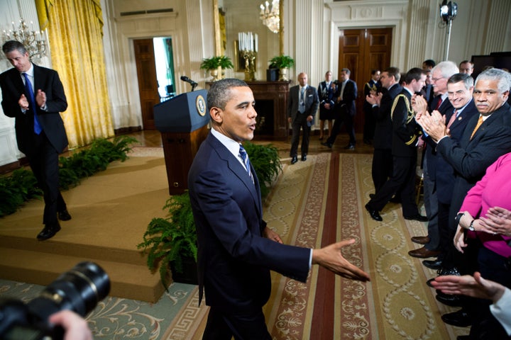 WASHINGTON - FEBRUARY 9: U.S. President Barack Obama shakes hands with audience members after delivering remarks on the No Child Left Behind law in the East Room of the White House on February 9, 2012 in Washington, DC. Obama announced that ten states that have agreed to implement reforms around standards and accountability will receive flexibility from the mandates of the federal education law. (Photo by Brendan Hoffman/Getty Images)