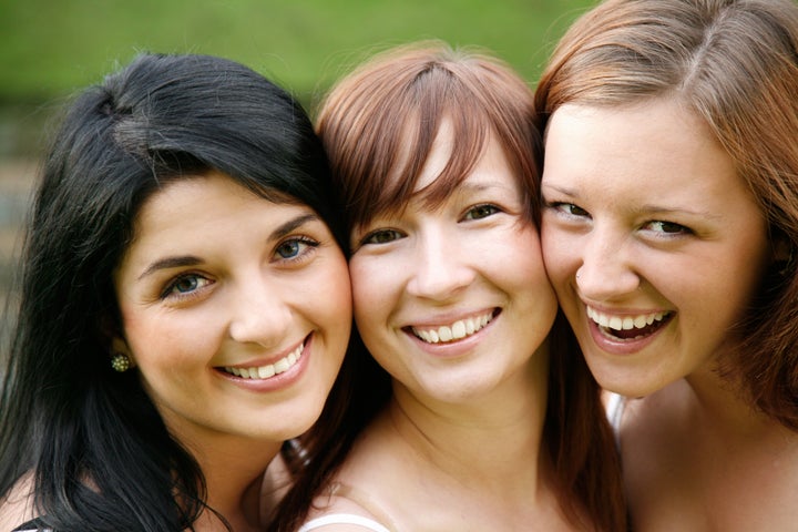 happy smiling girl friends outdoor