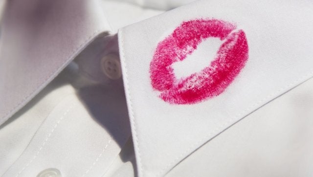 red lipstick on shirt collar