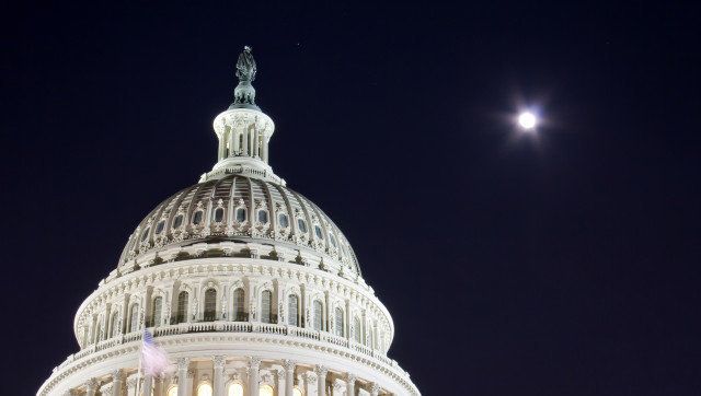 capitol dome with full moon ...