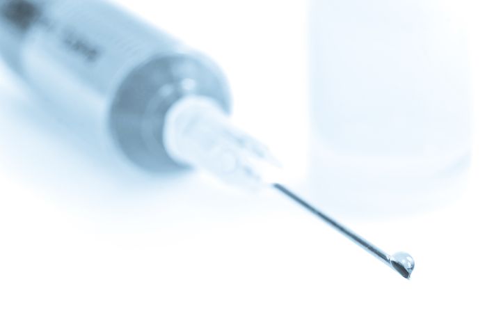 vaccine with hypodermic syringe ...