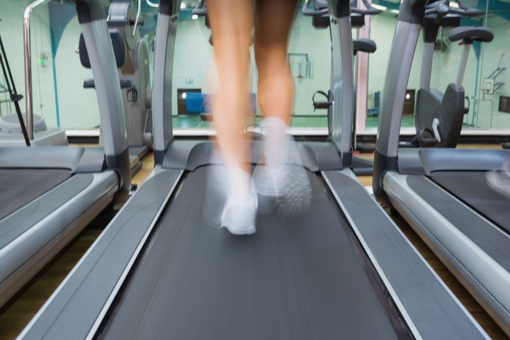 running on a treadmill in the...