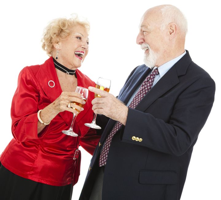 senior couple celebrating a...