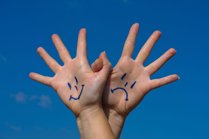 linked hands with smiles and...