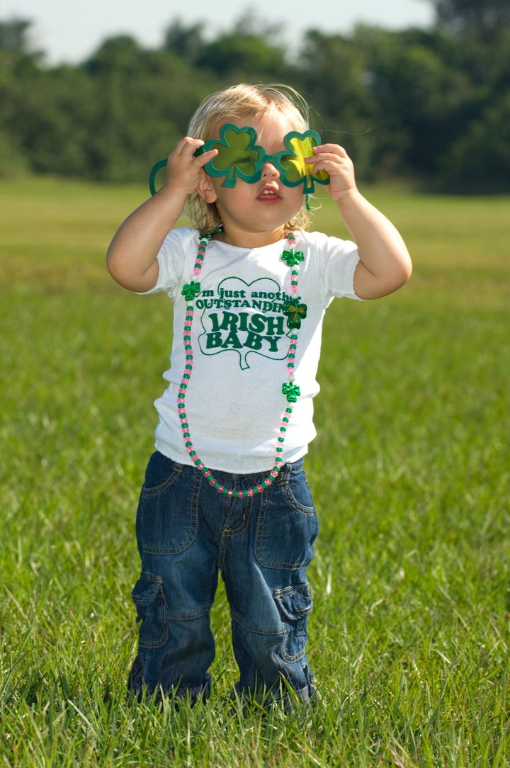 Adorable little girl in jeans and Irish t shirt