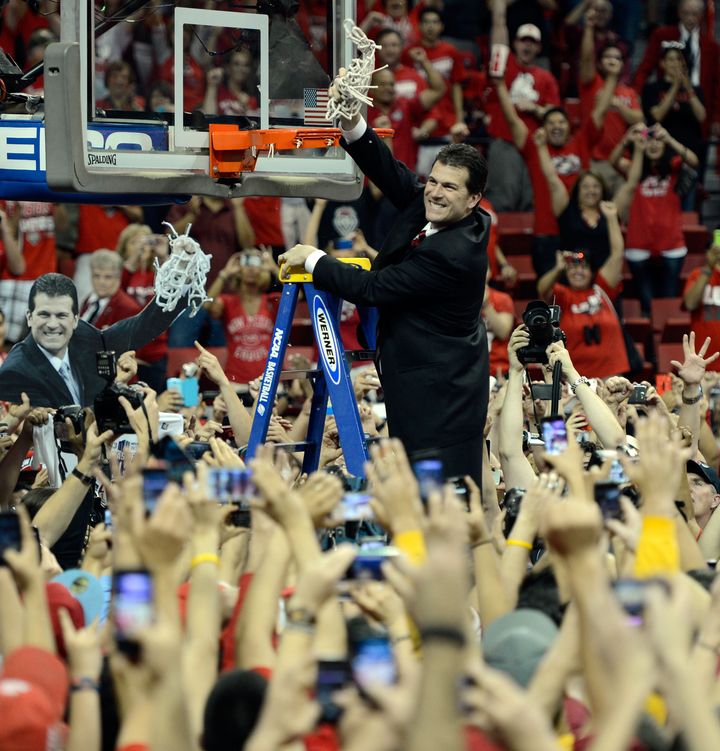 LAS VEGAS, NV - MARCH 16: Head coach Steve Alford of the New Mexico Lobos cuts down the net after defeating the UNLV Rebels 63-56 to win the the championship game of the Reese's Mountain West Conference Basketball tournament at the Thomas & Mack Center on March 16, 2013 in Las Vegas, Nevada. (Photo by Jeff Bottari/Getty Images)