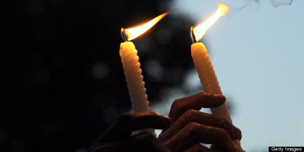 Indian activists take part in a candlelight vigil in Kolkata on December 30, 2012, after the cremation ceremony for a gangrap