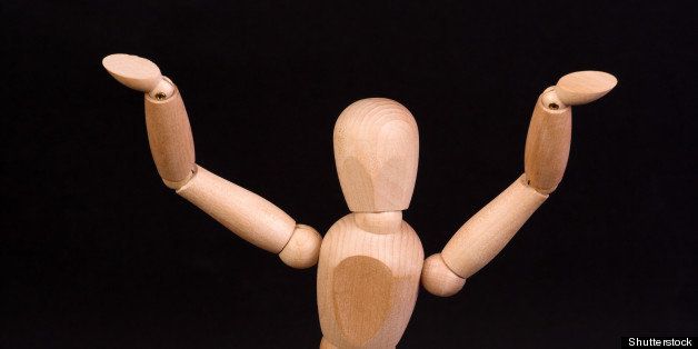 a wooden mannequin dancing