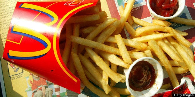 NEW YORK - SEPTEMBER 3: French fries are shown in a McDonald's restaurant on First Avenue September 3, 2002 in New York City. McDonald's announced plans to use a new cooking oil for its french fries that it says will cut in half the trans-fatty acid levels while increasing the amount of the more beneficial polyunsaturated fat. (Photo by Mario Tama/Getty Images)