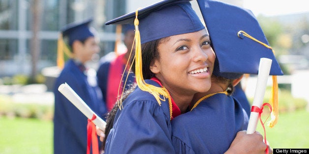 Graduates hugging