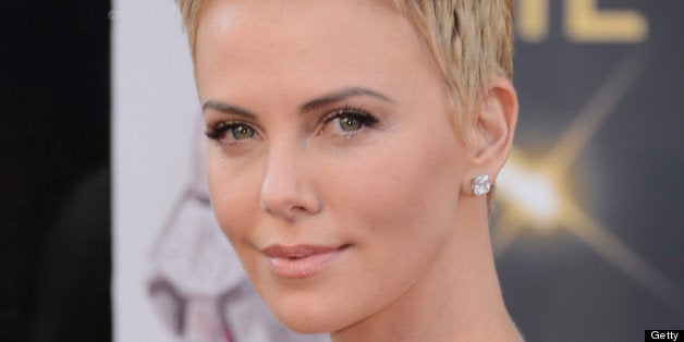 HOLLYWOOD, CA - FEBRUARY 24: Actress Charlize Theron arrives at the Oscars at Hollywood & Highland Center on February 24, 20