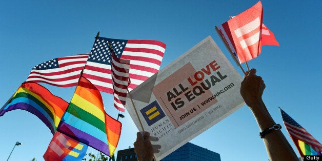 WEST HOLLYWOOD, CA - JUNE 26: Same-sex marriage supporters celebrate the US Supreme Court ruling during a community rally on June 26, 2013 in West Hollywood, California. The Supreme Court struck down the Defense of Marriage Act (DOMA) and ruled that supporters of California's ban on gay marriage, Proposition 8, could not defend it before the Supreme Court. (Photo by Kevork Djansezian/Getty Images)