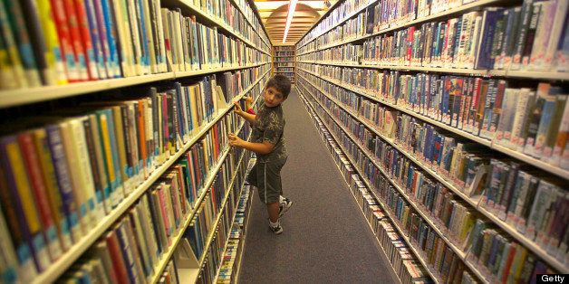 Miami, Florida. A boy in the Miami Dade Public Library.