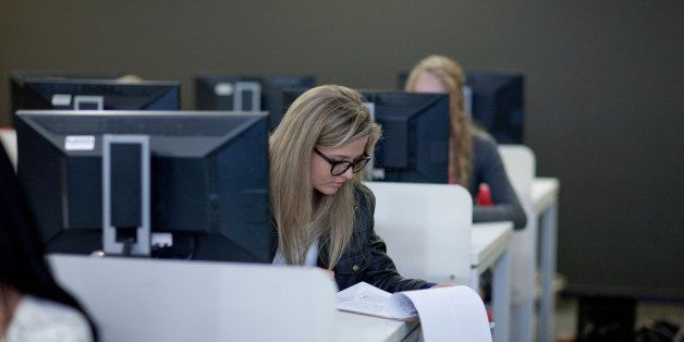 Students using computers in class