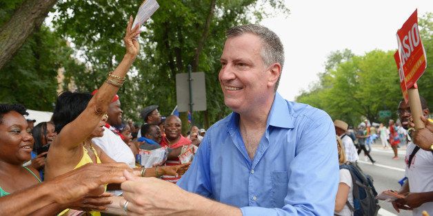 NEW YORK, NY - SEPTEMBER 02: Mayoral candidate Bill de Blasio campaigns at the West Indian Day Parade on September 2, 2013 in the Brooklyn borough of New York City. Over a million people are expected to attend the 46th annual parade. (Photo by Michael Loccisano/Getty Images)