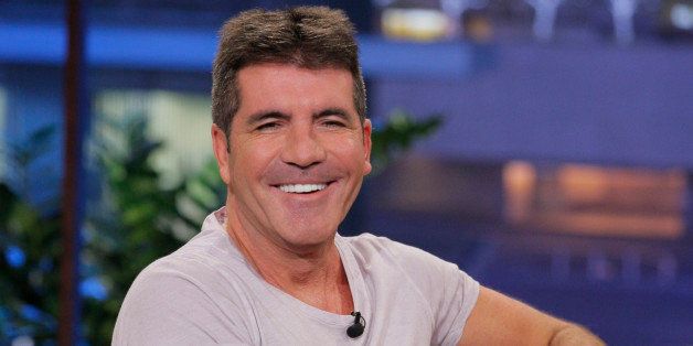 THE TONIGHT SHOW WITH JAY LENO -- Episode 4523 -- Pictured: TV personality Simon Cowell during an interview on September 6, 2013 -- (Photo by: Paul Drinkwater/NBC/NBCU Photo Bank via Getty Images)