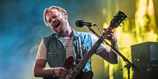 CHELMSFORD, UNITED KINGDOM - AUGUST 18: Caleb Followill of Kings of Leon performs on day 2 of the V Festival at Hylands Park on August 18, 2013 in Chelmsford, England. (Photo by Neil Lupin/Getty Images)