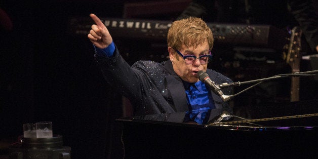 LOS ANGELES, CA - SEPTEMBER 16: Musician Elton John performs songs from his new album The Diving Board with USC Thornton School of Music students. The album release date is September 24th on Capital Records. Event held at Bovard Auditorium At USC on September 16, 2013 in Los Angeles, California. (Photo by Christopher Polk/Getty Images)