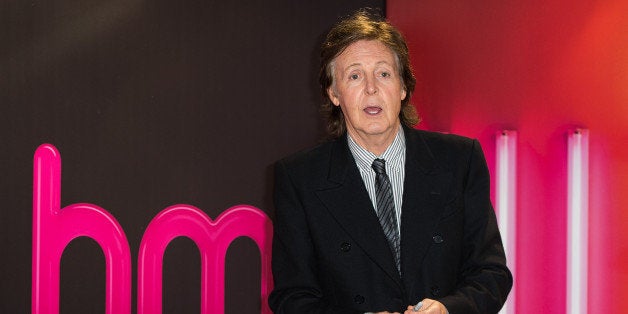 LONDON, ENGLAND - OCTOBER 18: Paul McCartney meets fans and signs copies of his album 'New' at HMV, Oxford Street on October 18, 2013 in London, England. (Photo by Ian Gavan/Getty Images)