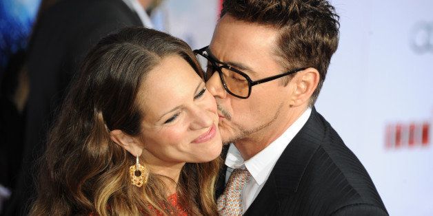 HOLLYWOOD, CA - APRIL 24: Actor Robert Downey, Jr. and wife Susan Downey arrive at the 'Iron Man 3' - Los Angeles Premiere at the El Capitan Theatre on April 24, 2013 in Hollywood, California. (Photo by Allen Berezovsky/WireImage)