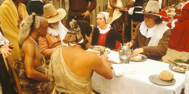 Living history reenactment of Pilgrims and Indians dining on Plymouth Plantation, Plymouth, MA (Photo by Visions of America/UIG via Getty Images)