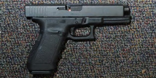 NEWTOWN, CT - UNSPECIFED DATE: In this handout crime scene evidence photo provided by the Connecticut State Police, shows a Glock 20, 10mm found near the shooter in Room 10 at Sandy Hook Elementary School following the December 14, 2012 shooting rampage, taken on an unspecified date in Newtown, Connecticut . A report was released November 25, 2013 by Connecticut State Attorney Stephen Sedensky III summarizing the Newtown school shooting that left 20 children and six women dead inside Sandy Hook Elementary School. According to the report, a motive behind the shooting by gunman Adam Lanza is still unknown. (Photo by Connecticut State Police via Getty Images)