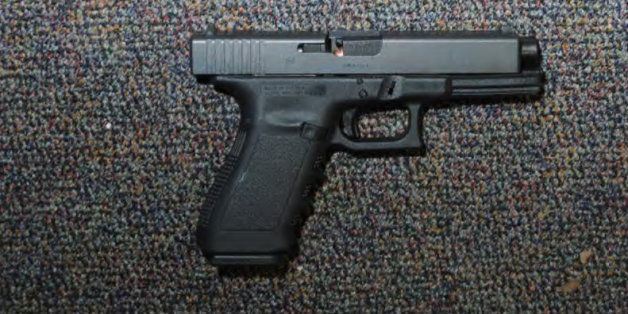 NEWTOWN, CT - UNSPECIFED DATE: In this handout crime scene evidence photo provided by the Connecticut State Police, shows a Glock 20, 10mm found near the shooter in Room 10 at Sandy Hook Elementary School following the December 14, 2012 shooting rampage, taken on an unspecified date in Newtown, Connecticut . A report was released November 25, 2013 by Connecticut State Attorney Stephen Sedensky III summarizing the Newtown school shooting that left 20 children and six women dead inside Sandy Hook Elementary School. According to the report, a motive behind the shooting by gunman Adam Lanza is still unknown. (Photo by Connecticut State Police via Getty Images)