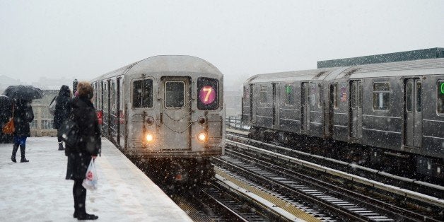 NEW YORK, USA - DECEMBER 10: Snowfall in New York city of US cause public transport retards and traffic jam at the brigdes,