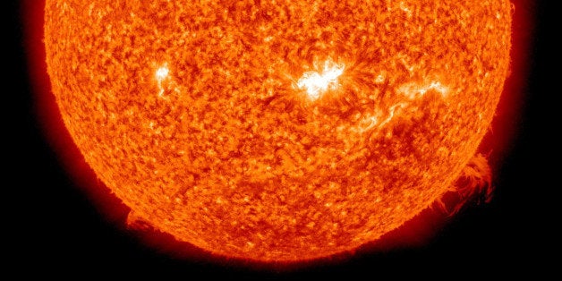 IN SPACE - FEBRUARY 15: In a screen grab taken from a handout timelapse sequence provided by NASA / SDO, a solar spot in the