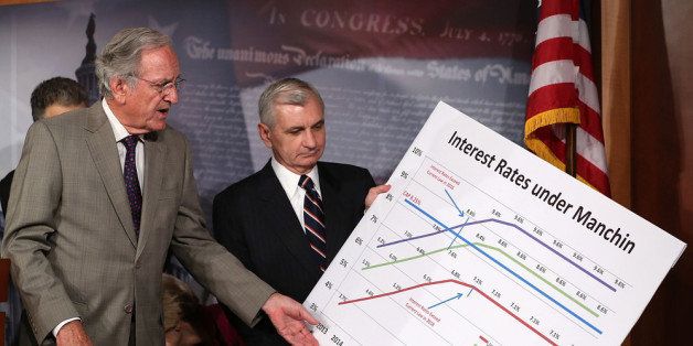 WASHINGTON, DC - JUNE 27: Sen. Tom Harkin, D-IA) (L), and Sen. Jack Reed,(D-RI) look at a chart on student loans during a news conference on Capitol Hill, June 27, 2013 in Washington, DC. The Senators talked about solutions to keep student loans from doubling on July 1st. (Photo by Mark Wilson/Getty Images)