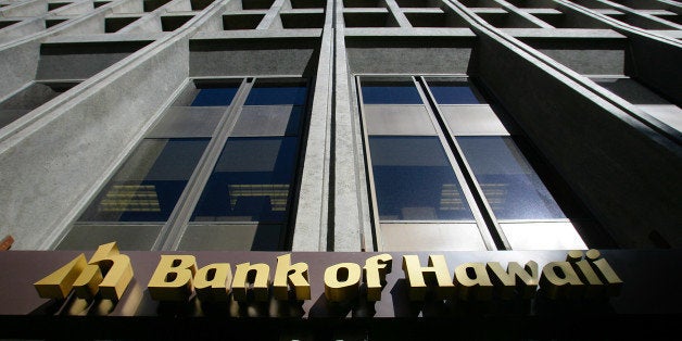 Bank of Hawaii Corp. signage is displayed outside of a branch in Honolulu, Hawaii, U.S., on Wednesday, Jan. 9, 2013. Honolulu