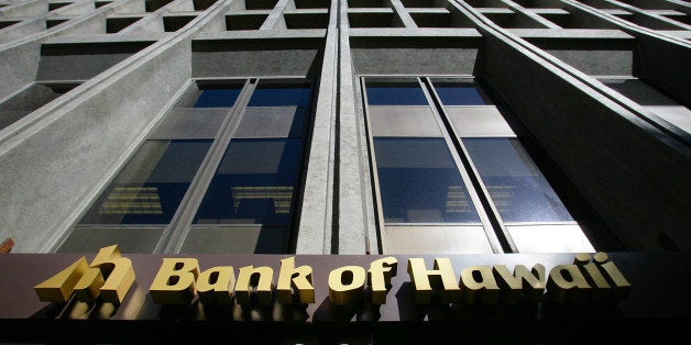 Bank of Hawaii Corp. signage is displayed outside of a branch in Honolulu, Hawaii, U.S., on Wednesday, Jan. 9, 2013. Honolulu, the southernmost major U.S. city, is a major financial center of the islands of the Pacific Ocean. Photographer: Tim Rue/Bloomberg via Getty Images