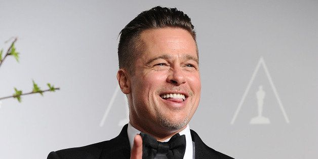HOLLYWOOD, CA - MARCH 02: Brad Pitt poses in the press room at the 86th annual Academy Awards at Dolby Theatre on March 2, 2014 in Hollywood, California. (Photo by Jason LaVeris/WireImage)