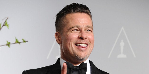 HOLLYWOOD, CA - MARCH 02: Brad Pitt poses in the press room at the 86th annual Academy Awards at Dolby Theatre on March 2, 2