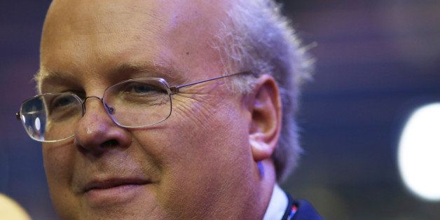 TAMPA, FL - AUGUST 28: Karl Rove, former Deputy Chief of Staff and Senior Policy Advisor to U.S. President George W. Bush, walks on the floor before the start of the second day of the Republican National Convention at the Tampa Bay Times Forum on August 28, 2012 in Tampa, Florida. Today is the first full session of the RNC after the start was delayed due to Tropical Storm Isaac. (Photo by Spencer Platt/Getty Images)