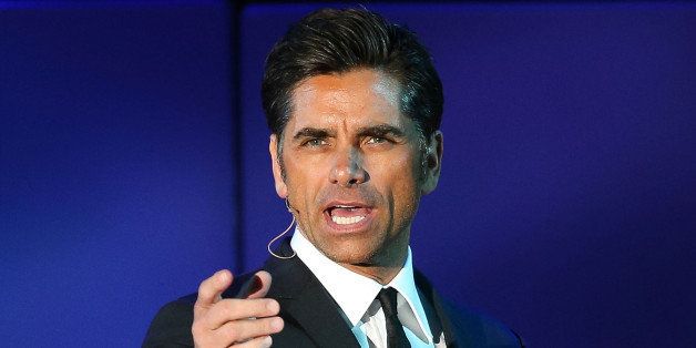 BEVERLY HILLS, CA - MARCH 26: Actor/singer John Stamos performs onstage at the 22nd A Night At Sardi's at The Beverly Hilton Hotel on March 26, 2014 in Beverly Hills, California. (Photo by Imeh Akpanudosen/Getty Images)