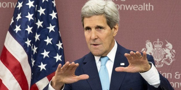 US Secretary of State John Kerry speaks during a press conference following the Friends of Syria meeting in London, on May 15, 2014. Kerry said that he had seen 'raw data' that suggest that chlorine has been used in the Syrian conflict.The Friends of Syria group gathered in London just days after UN-Arab League peace envoy Lakhdar Brahimi stepped down after almost two years of fruitless efforts to end the war. AFP PHOTO / POOL/ JACQUELYN MARTIN (Photo credit should read JACQUELYN MARTIN/AFP/Getty Images)