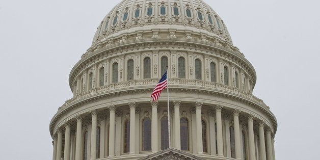 The dome of the US Capitol is seen March 19, 2014 in Washington, DC. As work continues on the dome restoration, the last chance for scaffold-free views of the Capitol is approaching, with the best opportunity within the next two weeks. AFP PHOTO/ Karen BLEIER (Photo credit should read KAREN BLEIER/AFP/Getty Images)