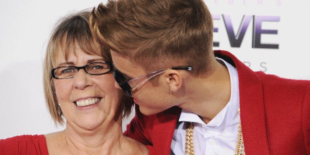 LOS ANGELES, CA - DECEMBER 18: Singer Justin Bieber and Diane Dale arrive at the Los Angeles Premiere 'Justin Bieber's Belie