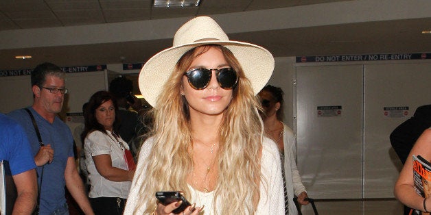 LOS ANGELES, CA - MAY 19: Vanessa Hudgens is seen at LAX on May 19, 2014 in Los Angeles, California. (Photo by GVK/Bauer-Gr