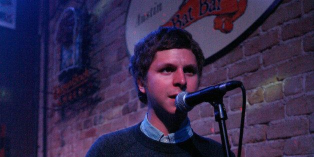 AUSTIN, TX - MARCH 15: Michael Cera performs with music group Mister Heavenly onstage at the 2011 SXSW Music, Film + Interactive Festival Campfire Trails Showcase at The Bat Bar on March 15, 2011 in Austin, Texas. (Photo by Scott Melcer/WireImage)