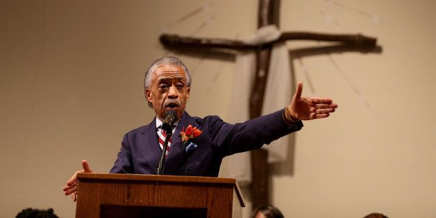 FERGUSON, MO - AUGUST 17: The Rev. Al Sharpton speaks to parishioners at the Greater St. Marks Family Church as the community seeks answers about the police shooting of Michael Brown on August 17, 2014 in Ferguson, Missouri. Unarmed teenager Michael Brown was shot and killed by a Ferguson police officer on August 9th. (Photo by Joe Raedle/Getty Images)
