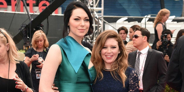 LOS ANGELES, CA - AUGUST 25: Actresses Laura Prepon (L) and Natasha Lyonne attend the 66th Annual Primetime Emmy Awards held