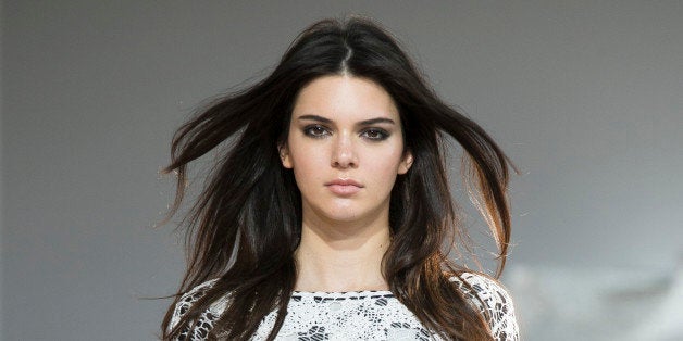 Kendall Jenner walks the runway as the Diane Von Furstenberg Spring 2015 collection is modeled during Fashion Week, Sunday, Sept. 7, 2014, in New York. (AP Photo/John Minchillo)